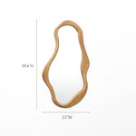 Asymmetrical mirror with a pine frame, measuring 39.4 inches in height and 22 inches in width, against a white background. The piece exudes natural energy, adding an organic touch to any decor.