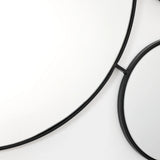 black-circular-mirror-and-a-white-circular-mirror-frame