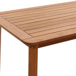 A solid Malaysian hardwood table with a smooth, slatted surface and sturdy legs, perfect as an outdoor dining table.