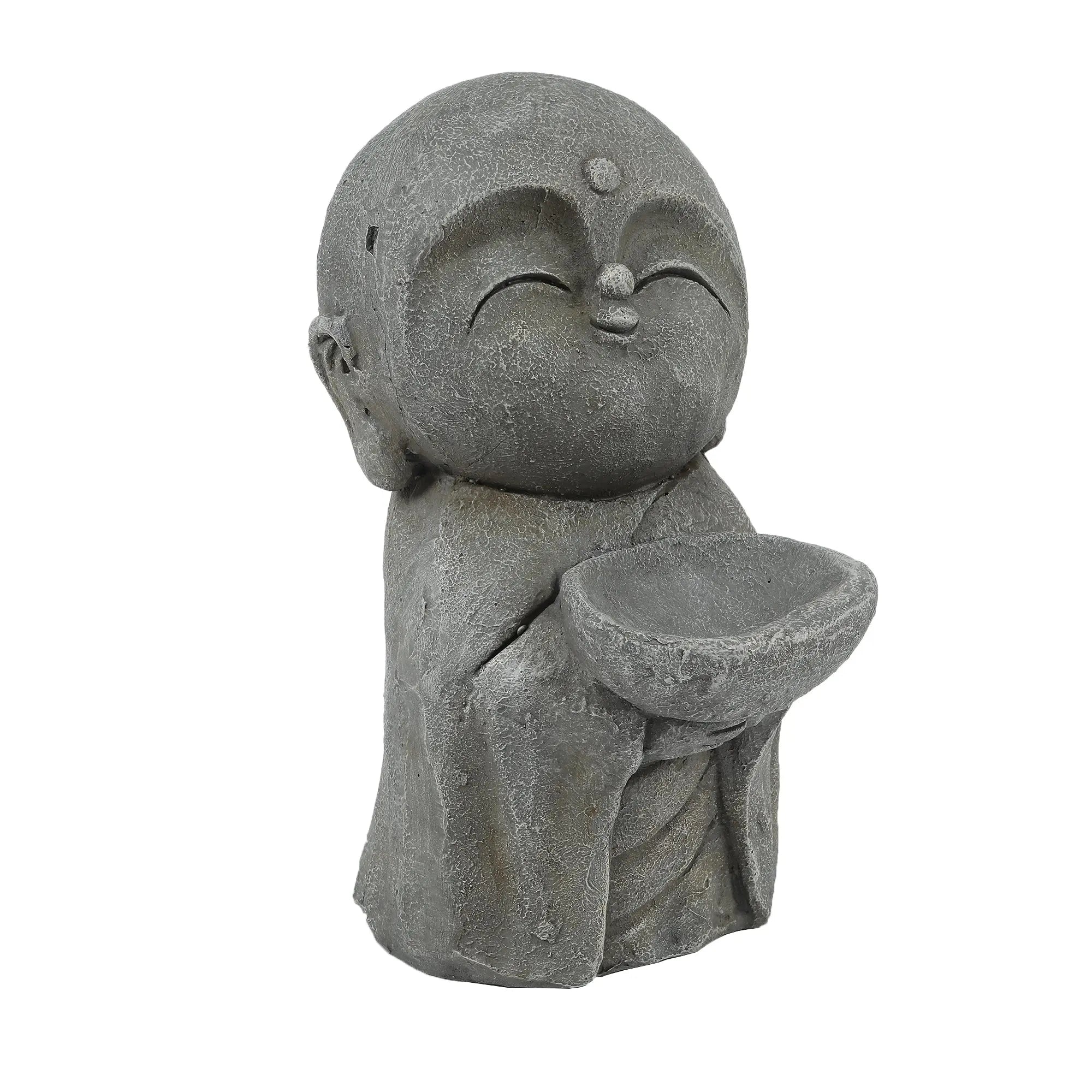 Gray stone Buddha monk statue of a small, smiling monk with closed eyes, holding a bowl in both hands, dressed in a simple robe—perfect as a serene garden statue or meditation centerpiece.