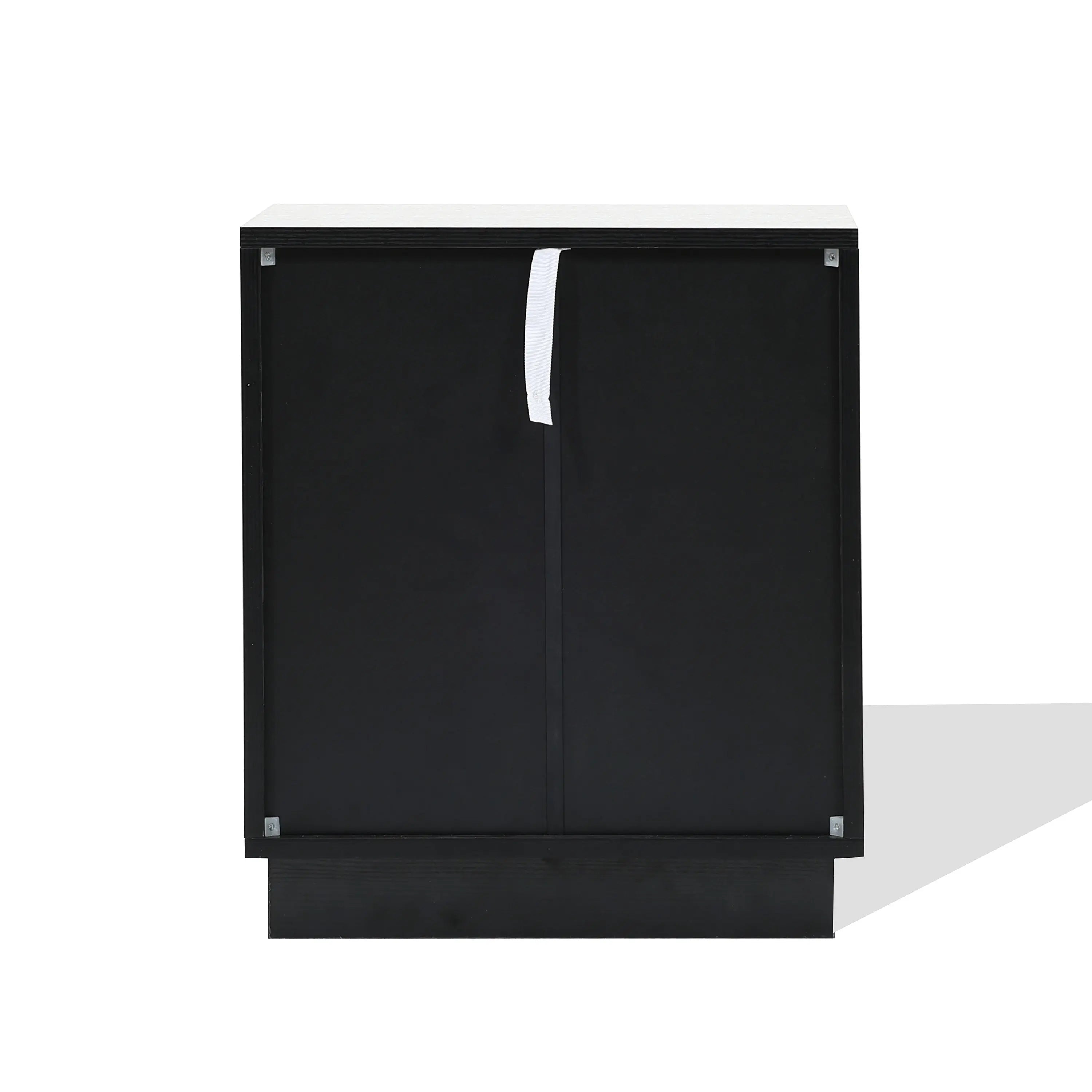 The LuxenHome Ethan bamboo stripped black nightstand is a modern side table featuring sleek white handles on two doors. Set against a plain white background, its minimalist design casts a soft shadow to the right.