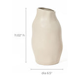Ivory white ceramic vase with an uneven shape, serving as a perfect accent piece, measuring 11.02 inches in height and 6.5 inches in diameter.