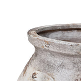 The LuxenHome Antique Cauldron Planter features a weathered, textured surface with a visible rim that enhances its vintage rustic charm against a plain white background.