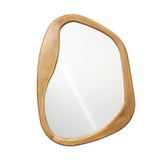 Organic and asymmetrical, this wooden framed mirror features a smooth finish, seamlessly blending natural elegance with decor sophistication.