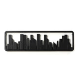 Black rectangular wall art featuring a minimalist city skyline silhouette, crafted with solid fir wood for an elegant touch.