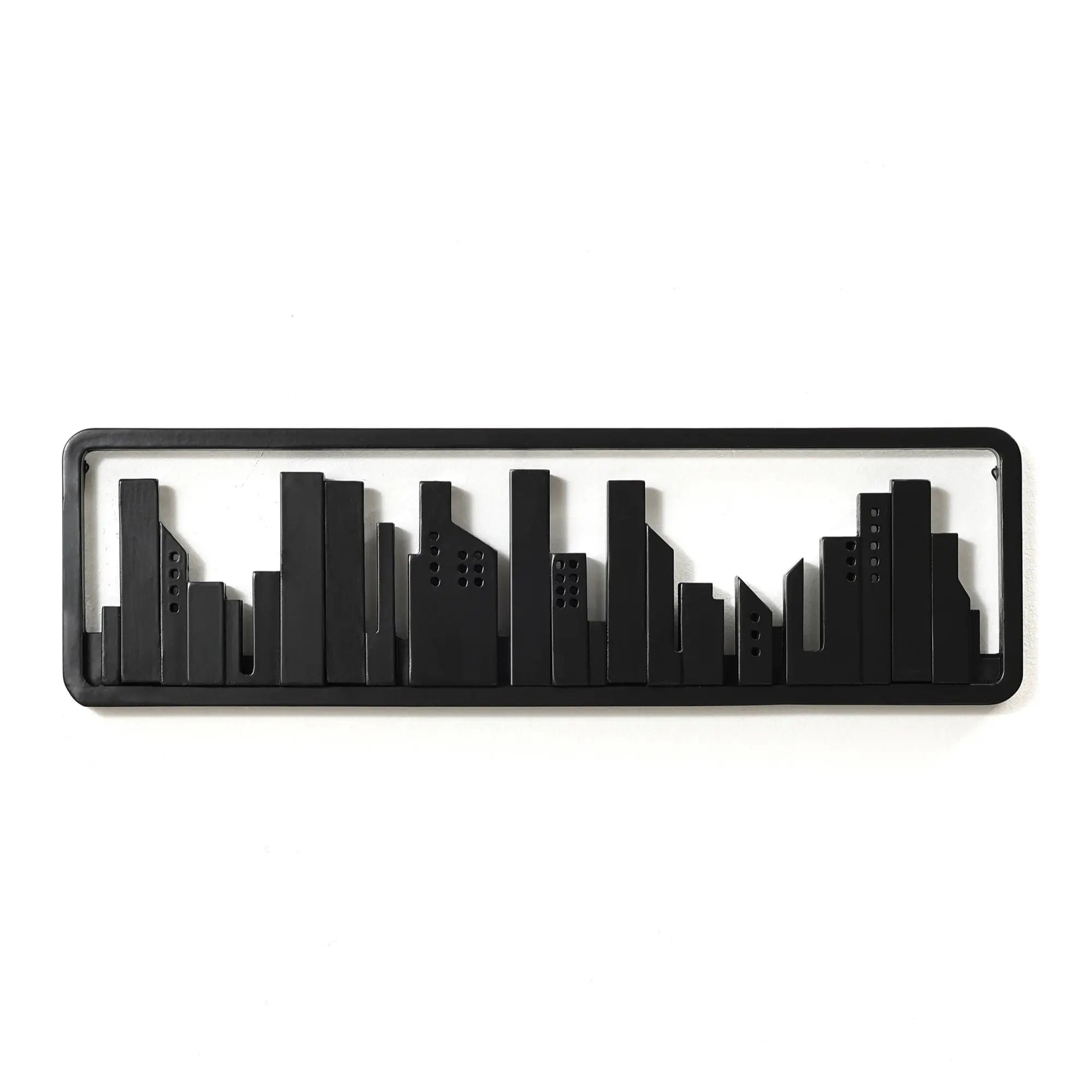 Black rectangular wall art featuring a minimalist city skyline silhouette, crafted with solid fir wood for an elegant touch.