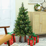 small-pre-lit-artificial-christmas-pine-tree-with-metal-pot-on-the-ground-with-gift-box