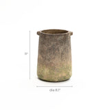 Stone vase with a cylindrical shape, 11 inches tall and 8.1 inches in diameter, featuring a ginger root brown finish. It exudes a rustic charm against a plain background.