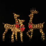 Christmas-deer-family-decorations-with-led-lights-and-red-bows