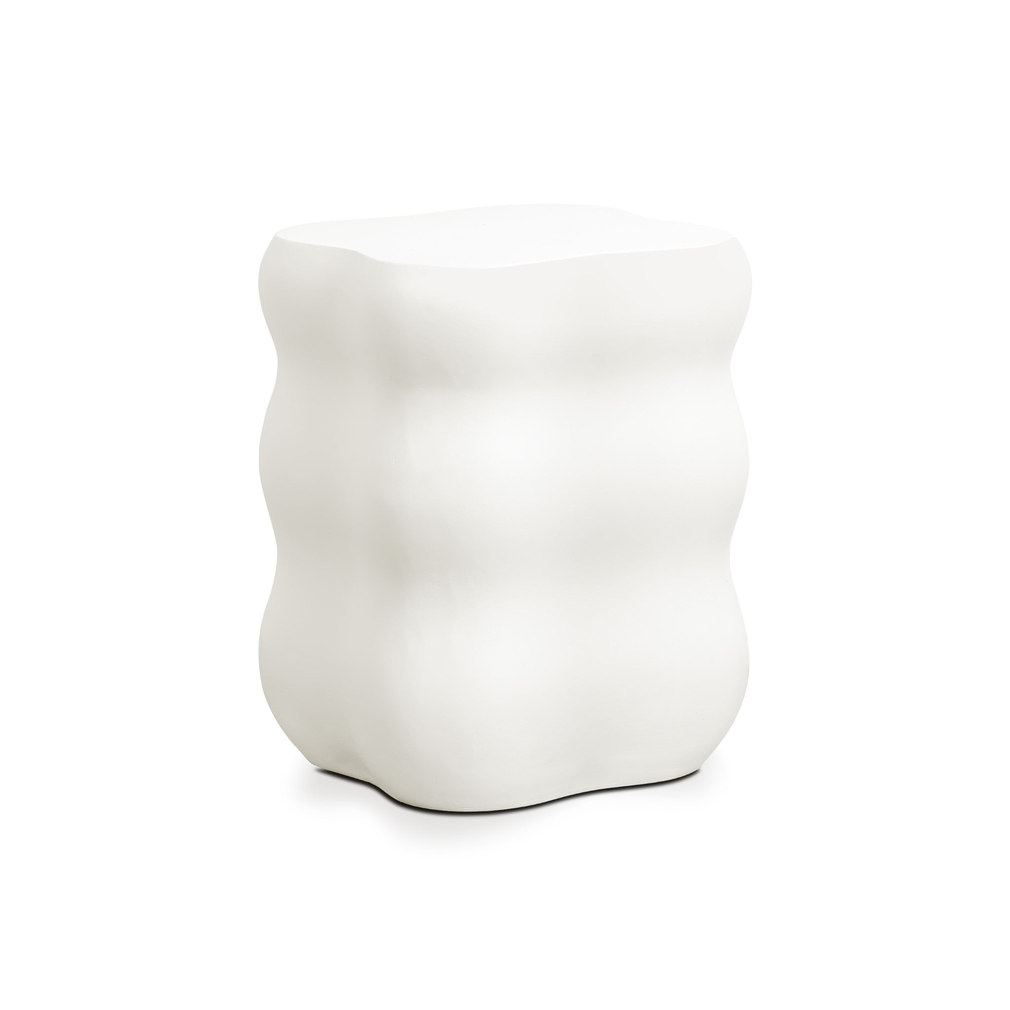 A white, ceramic stool with a wavy, ribbed design and a rectangular top perfectly embodies modern home furnishings.