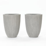 Two tall, gray, weather-resistant planters with a textured finish are placed side by side against a white background.