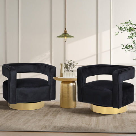 set of 2 black velvet modern accent chairs with gold bases, a gold color end table in between