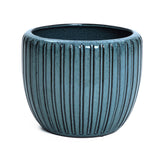 Sea-green ceramic flowerpot with vertical ridges, crafted from high-quality materials.