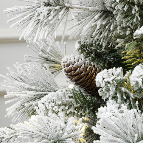 vintage-christmas-tree-with-each-branch-dusted-in-soft-white-flocking