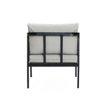 Back view of a cushioned chair with a black metal frame, light gray fabric, and waterproof cushions. Perfectly complements an outdoor armchair set for a stylish patio setup.