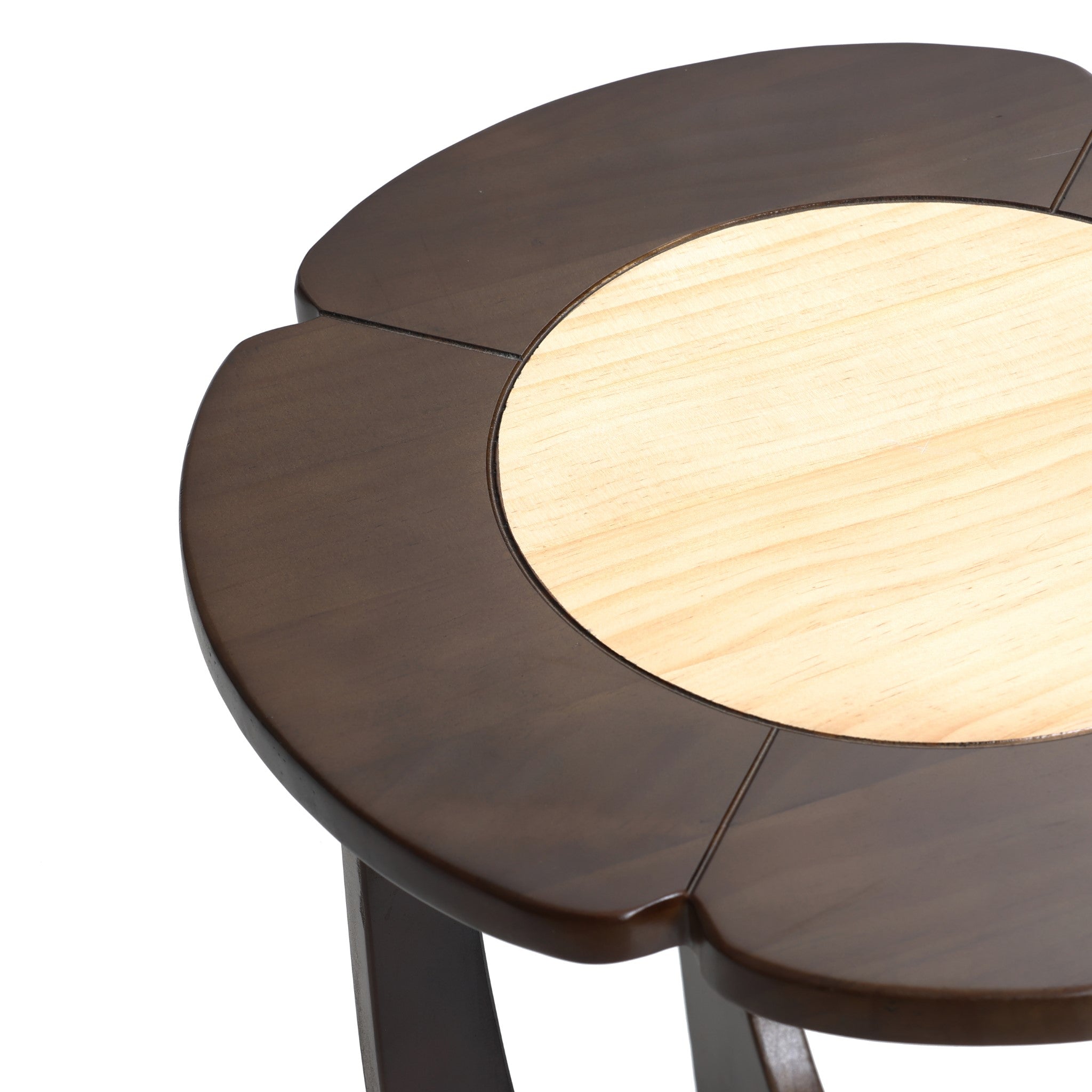 The Sunflower wood end/side table by LuxenHome features a modern design with a dark brown outer edge and a lighter natural wood center. Its petal-like segments converge seamlessly, making it an elegant focal point in any space.