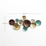 A stunning piece of metal wall art, this collection of decorative discs in brown, gold, and teal hues is arranged in an abstract design. With dimensions of 47.24 inches wide and 22.83 inches tall, its the perfect wall decoration to add a touch of elegance to any space.