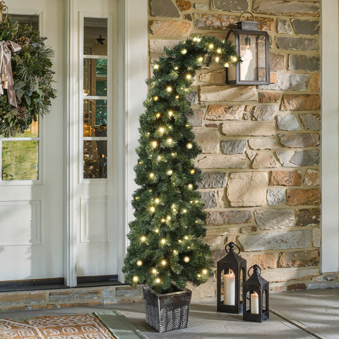 place-this-green-artificial-potted-christmas-tree-in-your-front-door