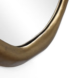 Close-up of an elegant bronze-framed, oval wall mirror with a smooth, curved edge against a white background.