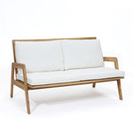 white-sofa-with-a-wooden-frame-and-white-cushions