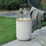 Fluted cement outdoor end table with faux wood top