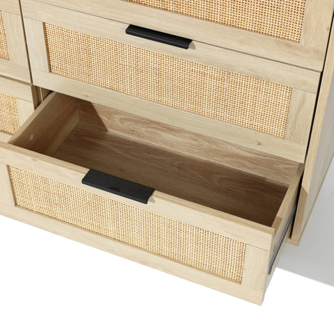 close up to the inside of a rattan dresser drawer