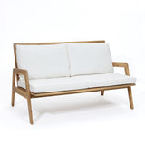 white-loveseat-with-a-wooden-frame-and-white-cushions 