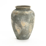 The LuxenHome Rustic Gold and Brown Terracotta Urn Vase, 13.6 high, has a textured finish in speckled gray and beige, evoking rustic decor. It stands out on a white backdrop with its wide body tapering to a slightly flared opening at the top.