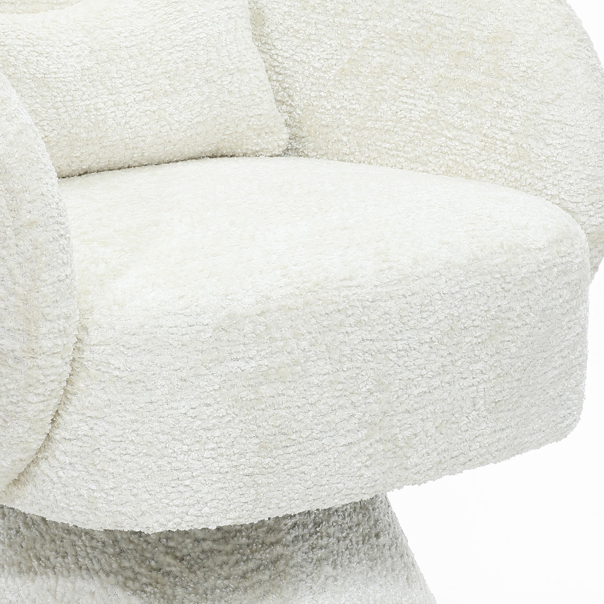 white-upholstered-chair-with-a-curved-back-and-seat-covered-in-white-fabric