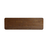 A long, rectangular wooden tabletop with rounded corners showcases a natural wood grain pattern, embodying the essence of minimalist design.
