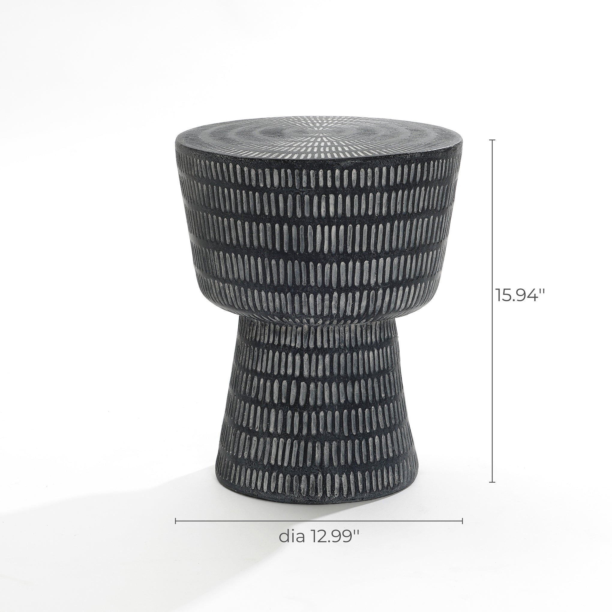 The LuxenHome Meru outdoor end/side table features a modern black magnesium oxide finish with vertical white lines. It is 15.94 inches tall with a 12.99-inch diameter, designed for outdoor use.