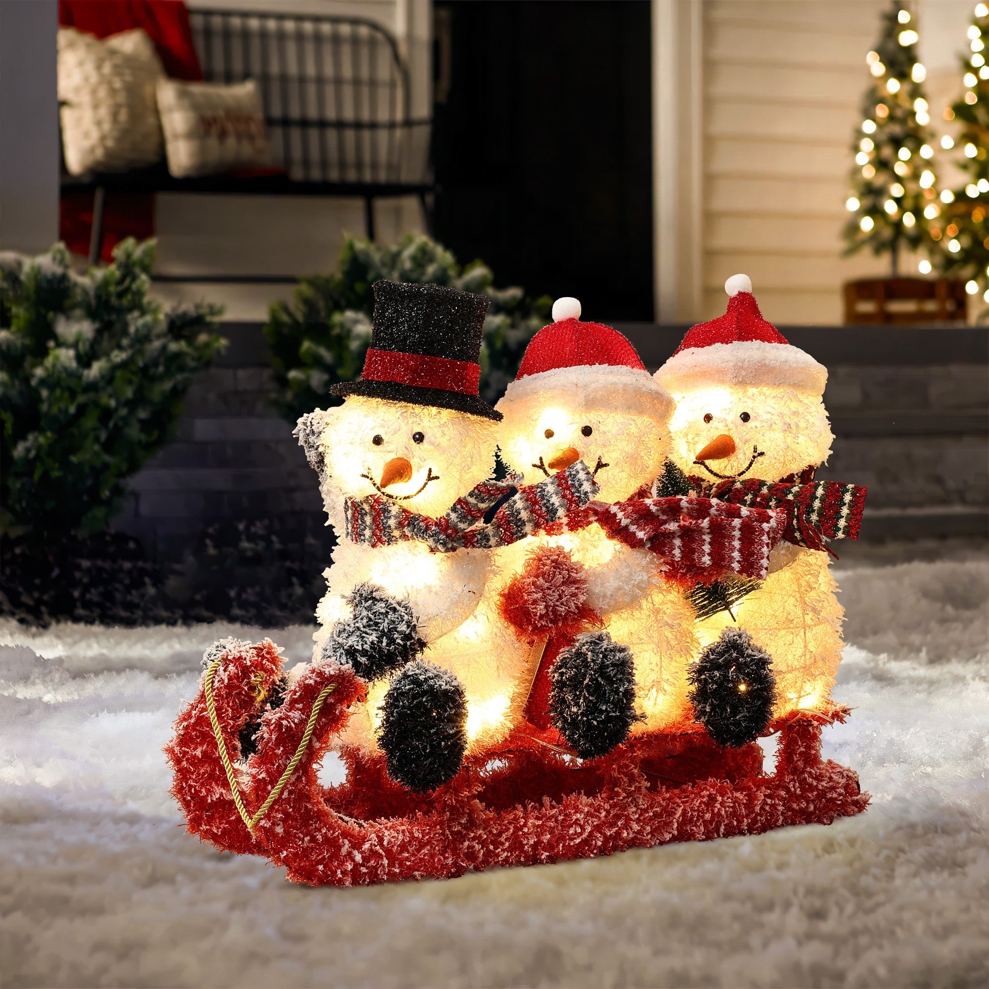 Adorable-Snowman-family-trio-on-sled-with-led-lights-outdoor-decoration