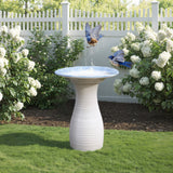 White ribbed ceramic bird bath