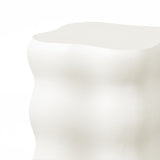 Abstract, wavy white sculpture crafted from MgO material with a smooth surface and curvilinear shape, reminiscent of a modern home furnishing, set against a plain background.