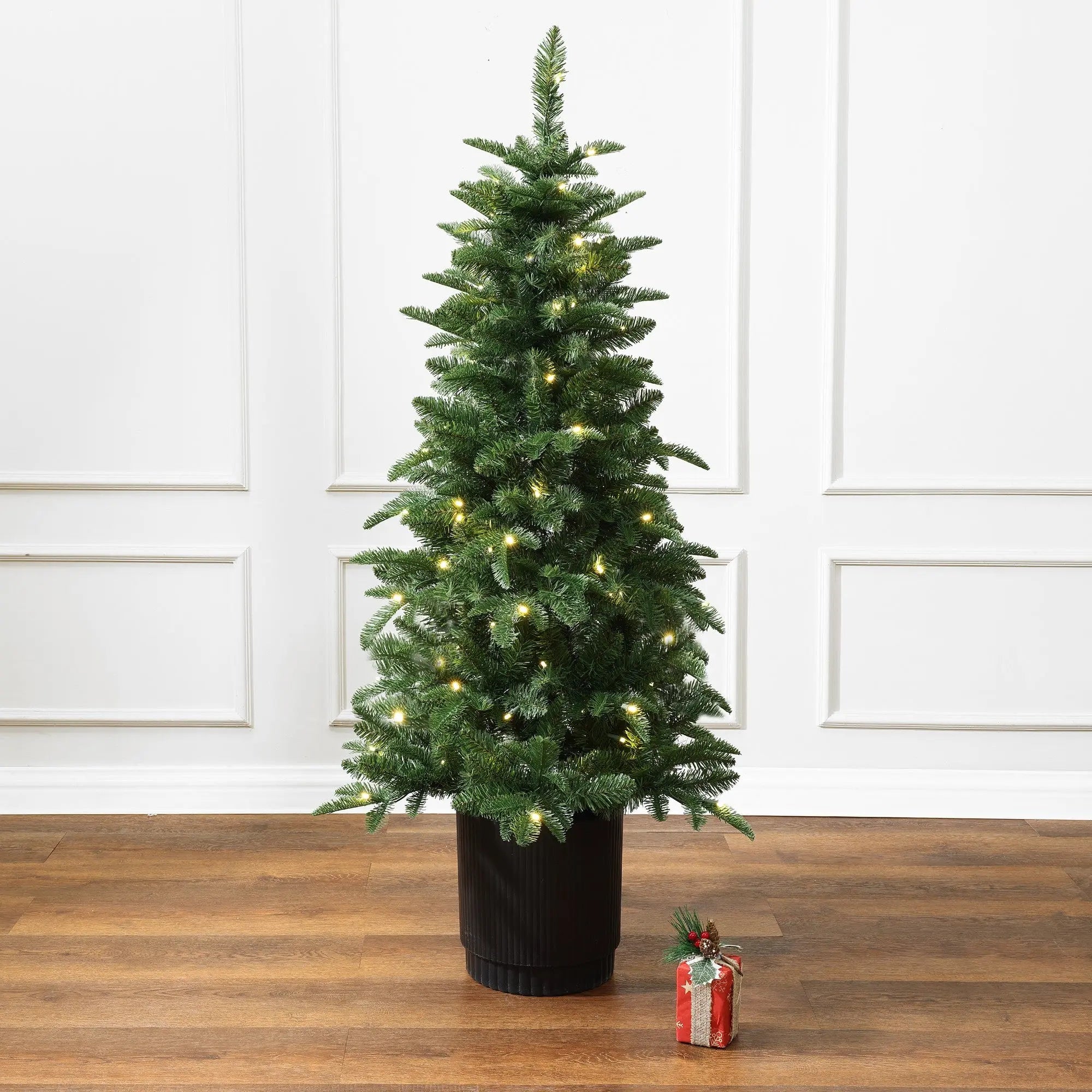 outdoor potted christmas plants LuxenHome 4.5Ft Pre-Lit Green Full Fir Potted Artificial Christmas Tree