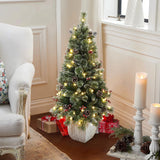 pre-lit-snow-flocked-potted-artificial-christmas-tree-with-70-warm-white-LED-lights-decorate-beside-the-door-makes-a-charm-of-the-holidays