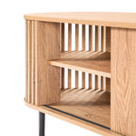 Close-up of a mid-century modern TV cabinet with vertical slats and open shelves, showcasing a natural wood grain finish. Supported by black metal legs, this piece embodies elegance while offering functionality.