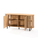 This mid-century modern buffet cabinet showcases a beautiful oak wood grain finish, with slatted sides and a rounded top. Open its doors to reveal spacious shelves inside, while it elegantly stands on black legs.