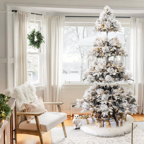 artificial-flocked-led-christmas-tree-stands-by-the-window