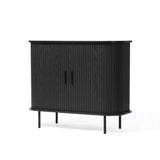 The Aria accent cabinet by LuxenHome combines modern minimalism with mid-century flair, featuring vertical tambour doors in a black finish and four slim metal legs.