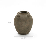 The LuxenHome Rustic brown terracotta cauldron vase stands 15.4 inches tall and 13 inches in diameter. With a natural elegance, it features two small top handles, a rounded body, and narrow opening, exuding timeless charm.