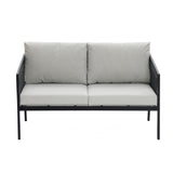 A modern gray two-seater sofa with metal arms and legs, featuring plush back and seat cushions, rests gracefully on a sleek black steel frame.