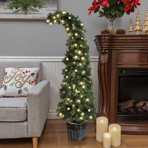 5-foot-pre-lit-potted-artificial-christmas-tree-is-perfect-for-display-beside-the-sofa