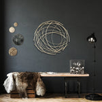 gold-metal-abstract-swirl-round-wall-decor