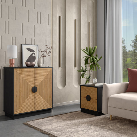 black frame and bamboo striped Ethan nightstand and accent cabinet in a modern style living room. The ethan nightstand is functional as an end table by a sofa with an indoor plant behind it.