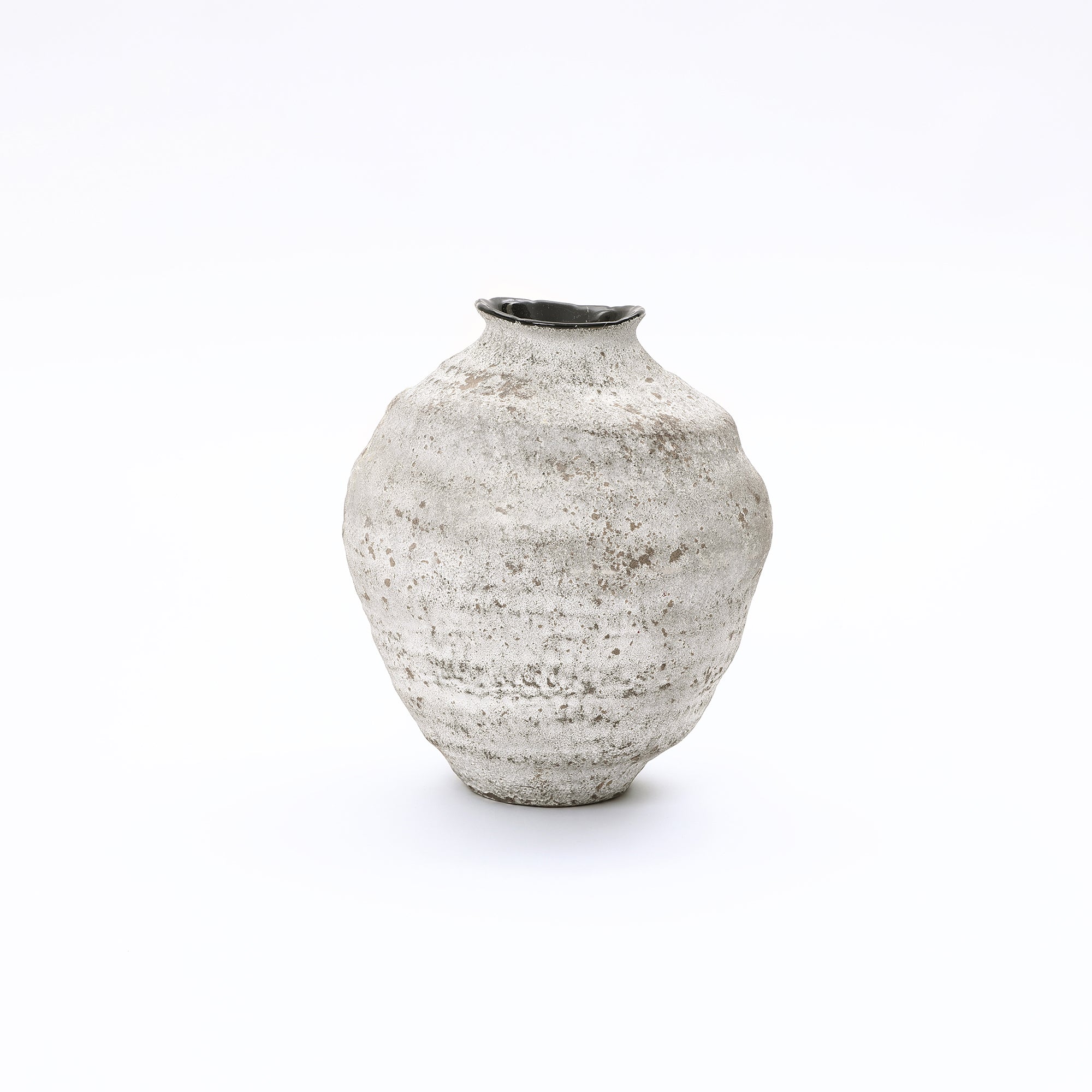 Textured cement vase in light gray with a rounded body and narrow, uneven opening, elevating your home décor.