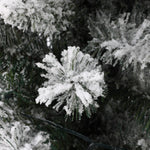 snow-dusted-artificial-tree-is-made-of-quality-PVC-branches