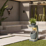 modern-outdoor-fountain-and-a-cactus