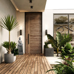 wooden-door-and-plants-outside-with-a-buddha