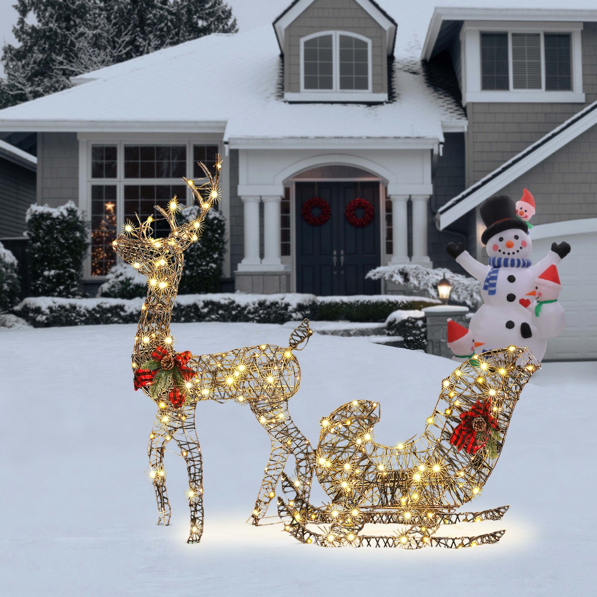 Outdoor-reindeer-pulling-a-sleigh-with-led-light-red-bows-and-pinecones